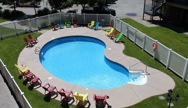 Executive Lakeshore Condo bordering the lake, the KVR trail and Lions Gardens.