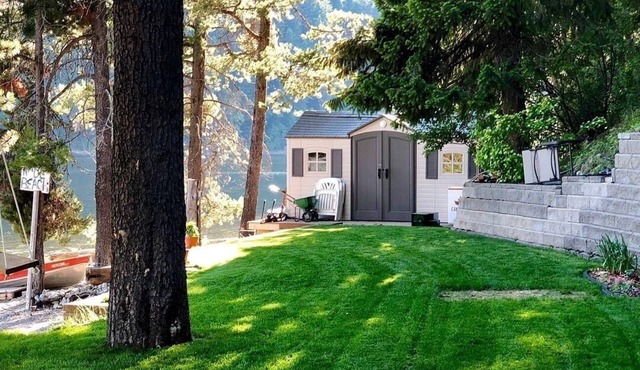 High-end three-level 3,000 sq ft home boasts 150 ft of private beachfront.