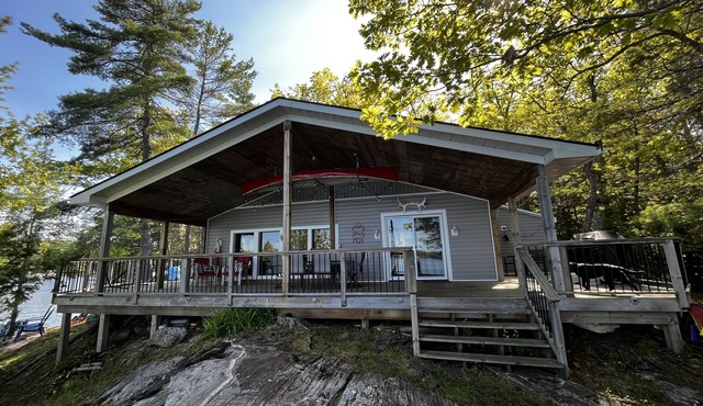 Lake view cottage, clean weed free swimming and a hot tub on Mississagua Lake