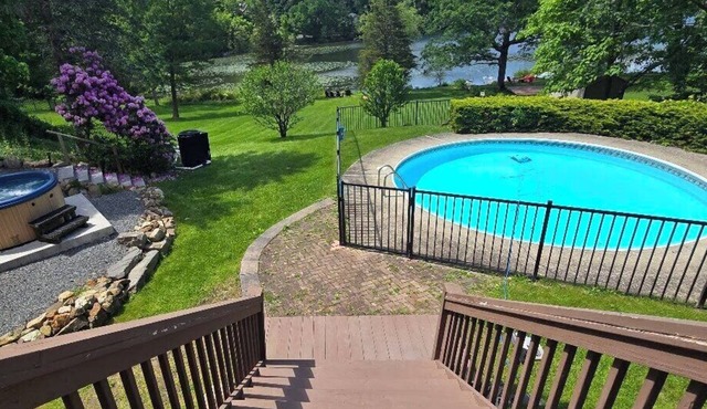 Lakefront retreat with stellar water views just a short drive from West.