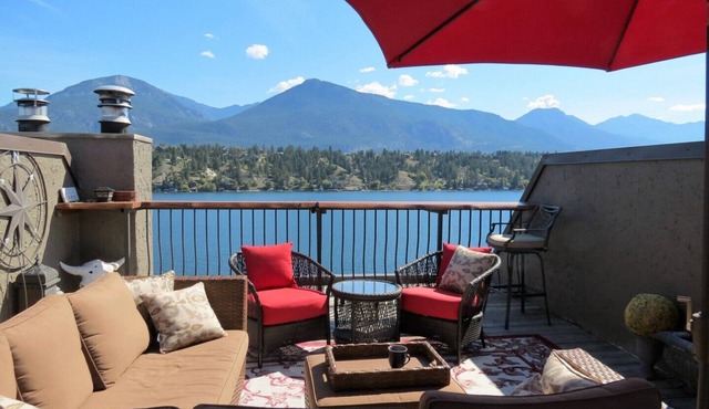 Lakefront townhome with outstanding mountain, and lake views and private deck