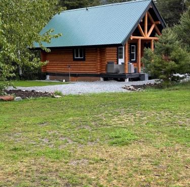 Lofted log cabin with fire table