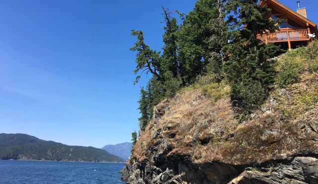 Log Cabin Perched on East Shore Kootenay Lake