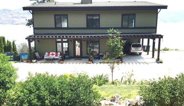 Lovely ground level suite, private lakefront home. Beautiful grounds. Great view