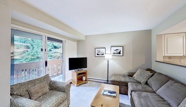 Lovely second-floor getaway with balcony views, pool, & hot tub - walk to lifts