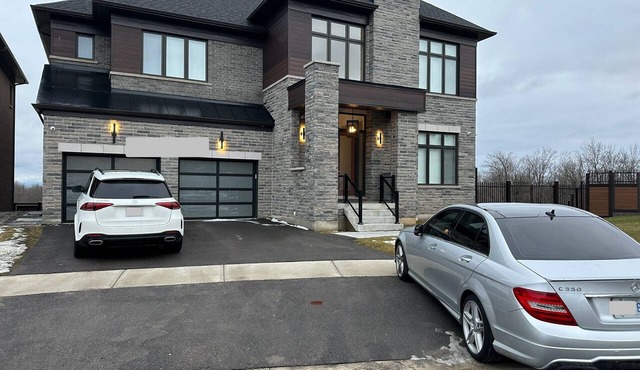 Luxurious open concept 2 bedroom apt on ravine, pond, central, airport, shopping