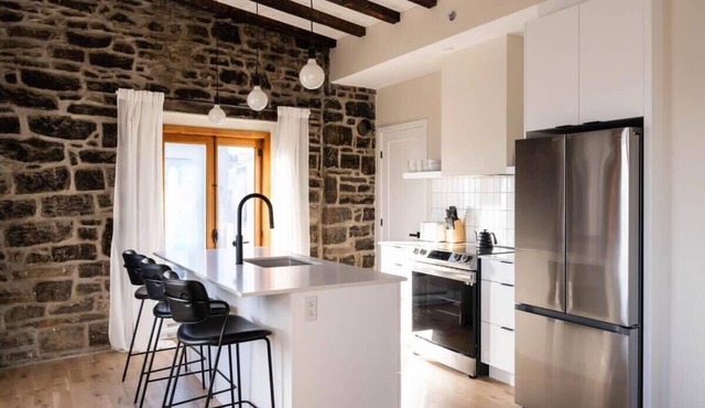 Maison Place Royale Luxury Waterfront Two-Bedrooms Apartment Old Montreal Water View St. Lawrence River Full Kitchen Stone Walls Wi-Fi AC