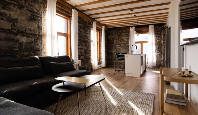 Maison Place Royale Luxury Waterfront Two-Bedrooms Apartment Old Montreal Water View St. Lawrence River Full Kitchen Stone Walls Wi-Fi AC