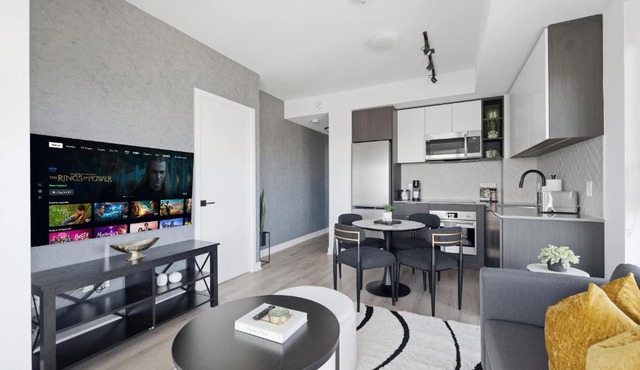 Modern 2BR Retreat with Private Balcony & Parking