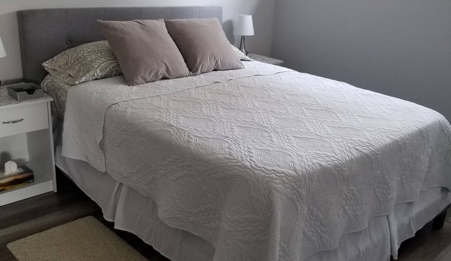 One bed apt w/private bathroom (1) free charge (1) car parking.