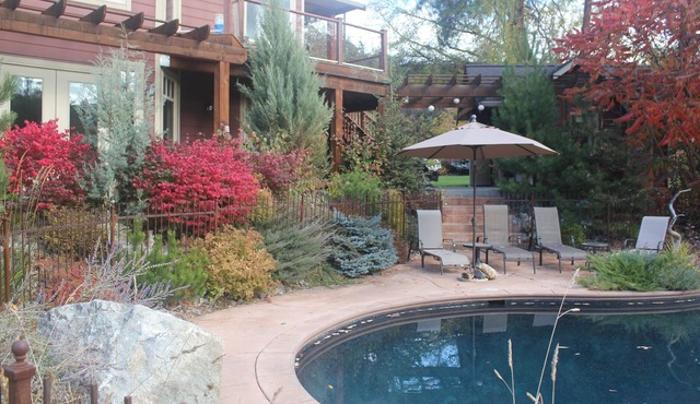 Parklike property on Coldstream creek, with pool, minutes to Kal beach