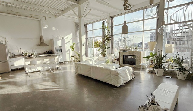 Penthouse loft with deck, rooftop and fireplace in historic Gastown, Vancouver.