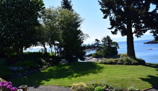 Seaside Family Home with a peaceful setting overlooking a sheltered bay