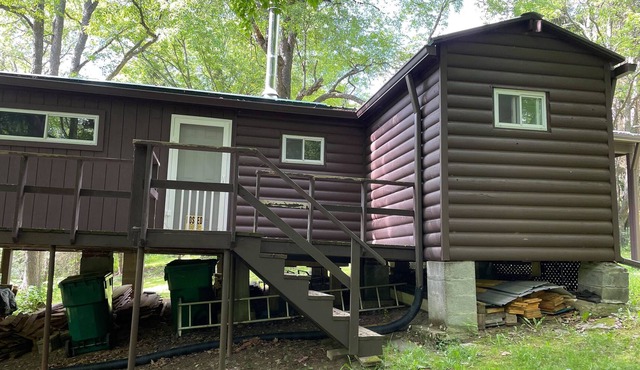 Secluded Off-Grid Cabin on 20 Acres of Woodland Featuring Many Ways to Enjoy
