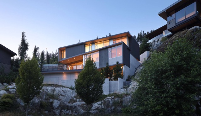 Spectacular architectural home immersed in nature with luxury furnishings.
