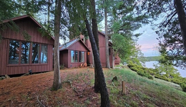 Spectacular South Facing Ultimate Privacy on Jack Lake with your own Sand Beach!