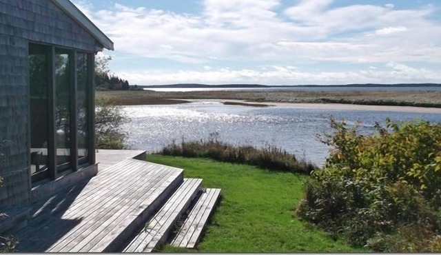 Spectacular views of beach from this waterfront cottage