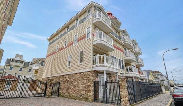 Steps from the famous Seaside Heights boardwalk beach! Family-sized townhouse.