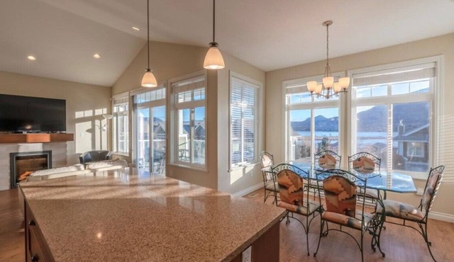 Steps to the Beach & Pools plus Spectacular Lake Views from the Deck.