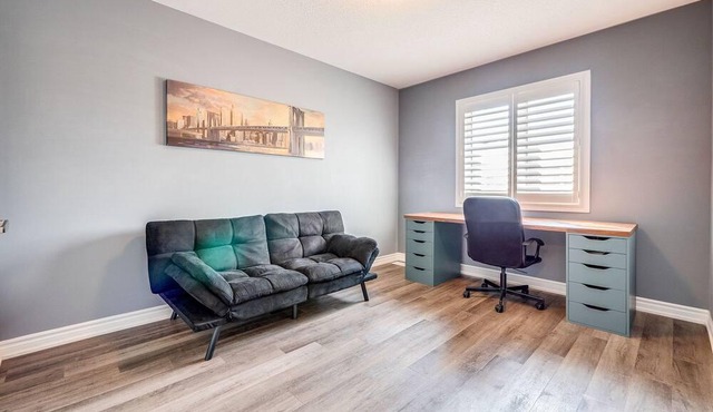 "Temporary Tranquility Awaits: 3-Bedroom Townhome in Milton, Ontario