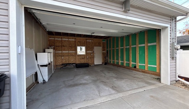 Three-bedroom House with Garage and Fenced Backyard