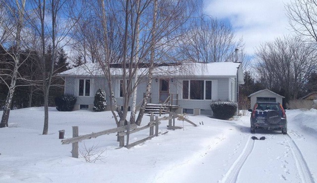 Treed 1/2 Acre Retreat minutes from the beach with famous Lake Huron sunsets!