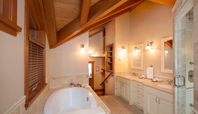Views and privacy from this gorgeous custom home.