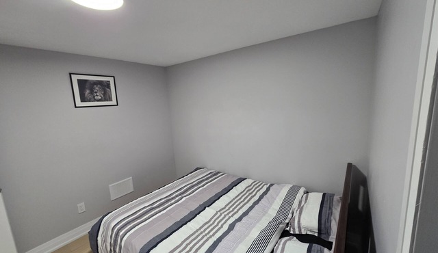 Walk to the Falls! 2BR Modern Home Base + Free Parking & Laundry