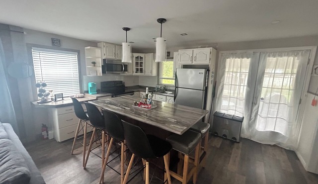 Welcome to our modern cozy two bedroom cottage located in Pointe-du-Chene