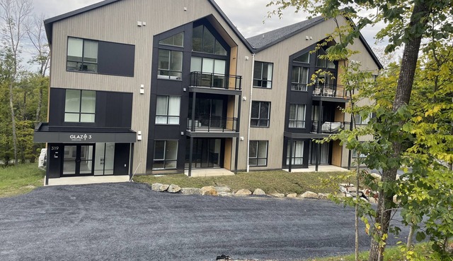 You’ll fall in love! Brand new family unit at Mont Owl’s Head with a dock!