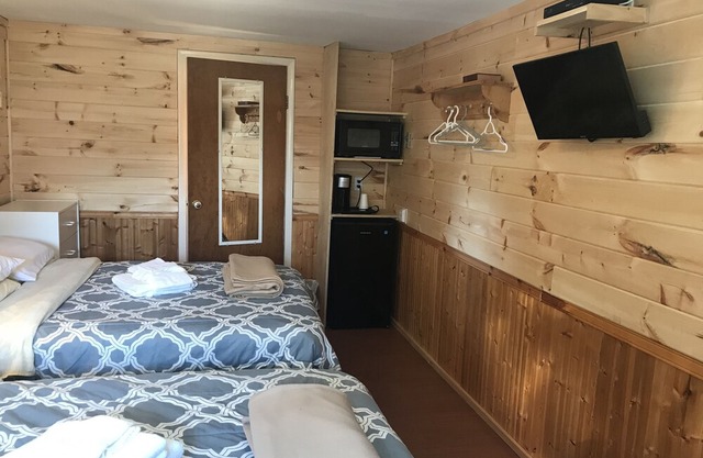 The Coastal Cabins- Cabin # 4, walking minutes from the sandy beach