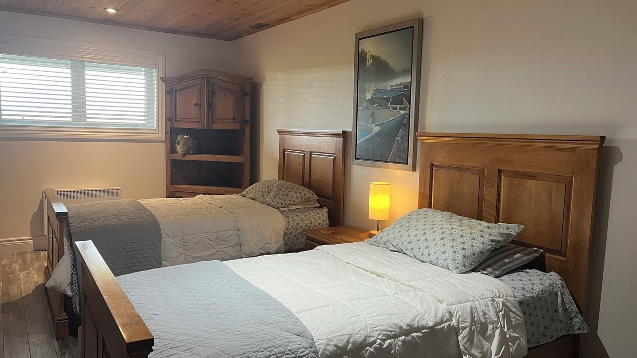 Photo of Bedroom in Saint-Aime-du-Lac-des-Iles