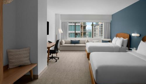 Queen Room with Two Queen Beds with Sofa Bed and River View