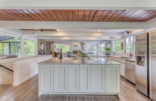 District of North Vancouver House | Modern 4BR Mid-Century Home - Solarium, Deck & Jacuzzi